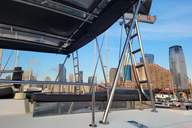  Yacht Photos Pics Bali 4.3 catamaran deck with city skyline in the background, 2019 model.