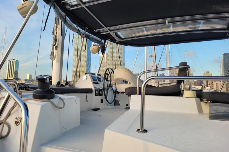  Yacht Photos Pics Cockpit of 2019 Bali 4.3 catamaran with city skyline in background.