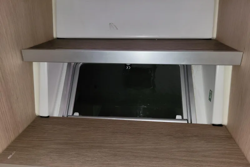  Yacht Photos Pics Interior view of a 2019 Bali 4.3 yacht window with wooden trim.