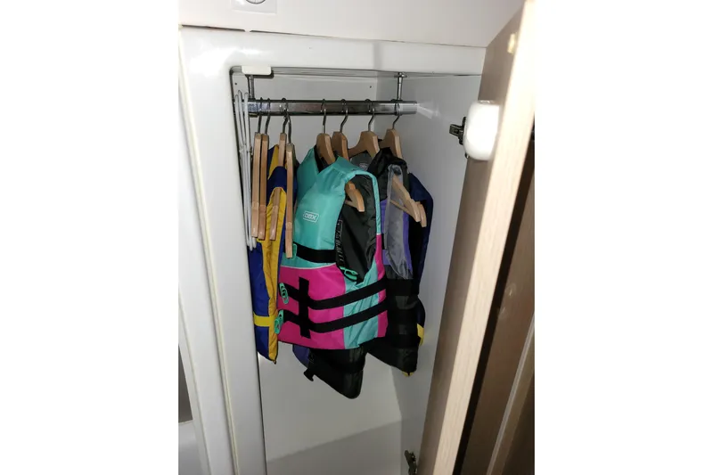  Yacht Photos Pics Life jackets hanging in a closet on a Bali 4.3, 2019 model.
