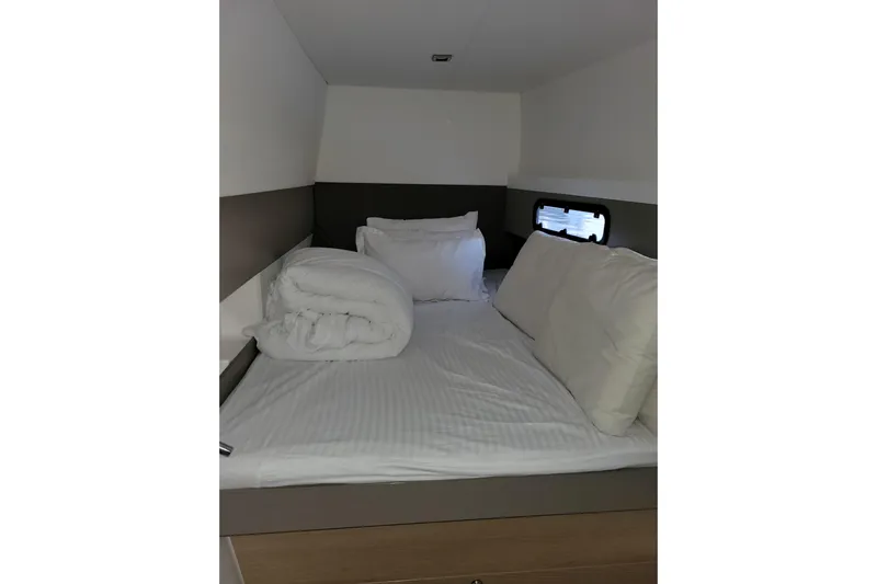  Yacht Photos Pics Cozy cabin bed in 2019 Bali 4.3 yacht with pillows and bedding.