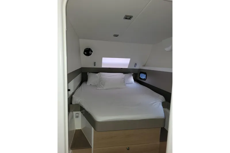  Yacht Photos Pics Cozy cabin interior of 2019 Bali 4.3 yacht with comfortable bed and modern design.