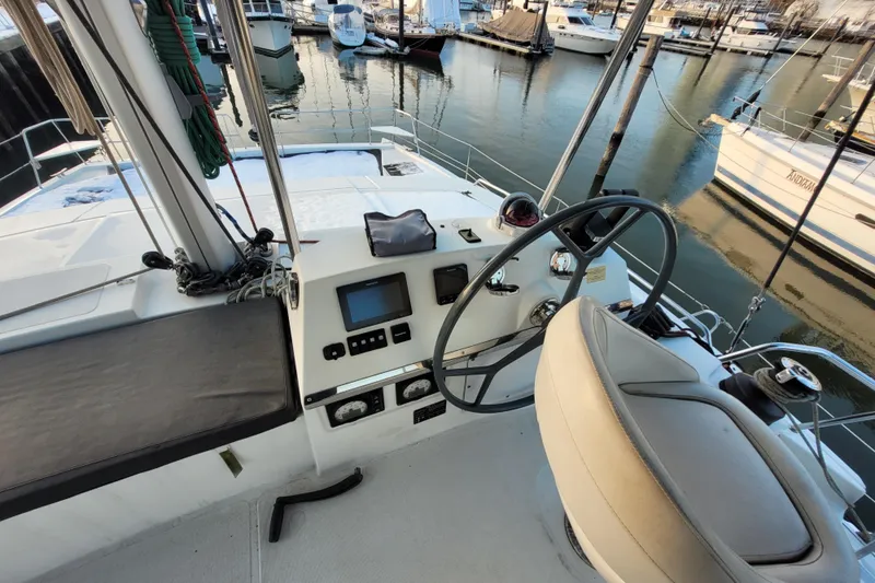  Yacht Photos Pics Cockpit view of a 2019 Bali 4.3 catamaran docked at a marina.