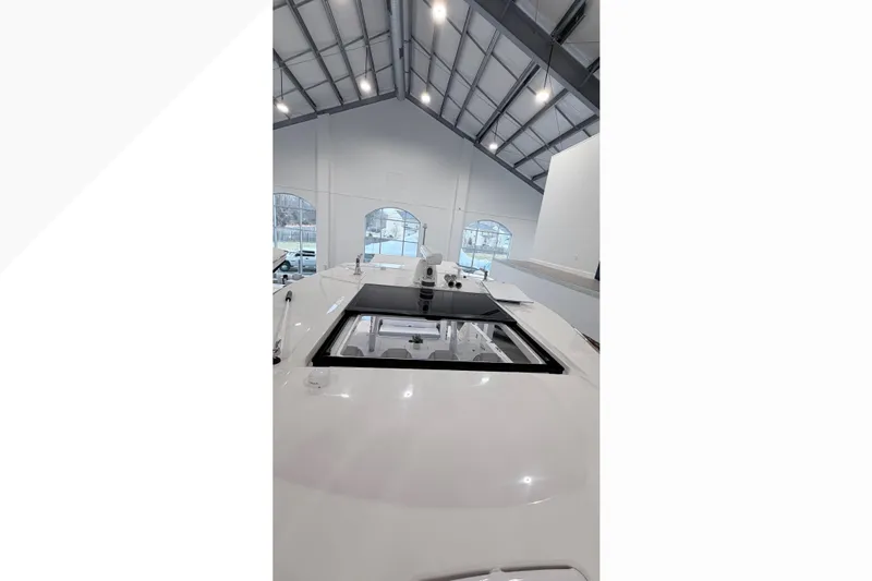  Yacht Photos Pics 2026 Regal 38 SAV yacht interior view in a spacious showroom.