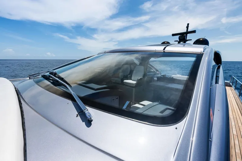  Yacht Photos Pics 2024 Pershing 6X yacht windshield with ocean view, showcasing sleek design and luxury.