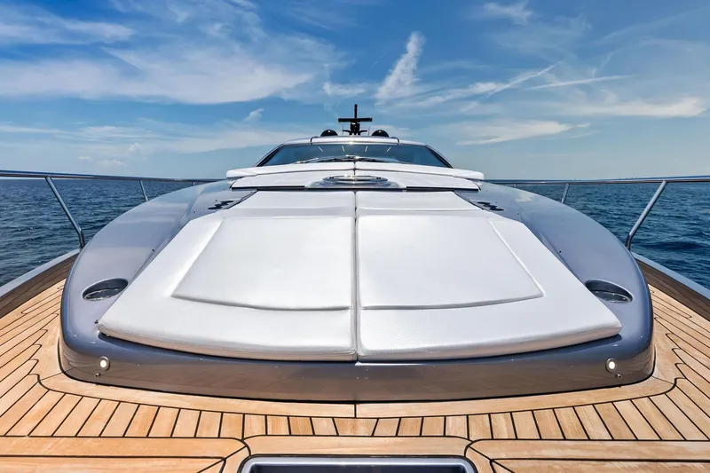  Yacht Photos Pics 2024 Pershing 6X yacht deck with sleek design and ocean backdrop.