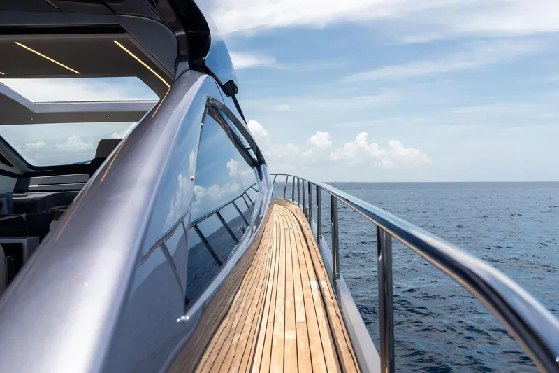  Yacht Photos Pics 2024 Pershing 6X yacht deck with ocean view and sleek design.