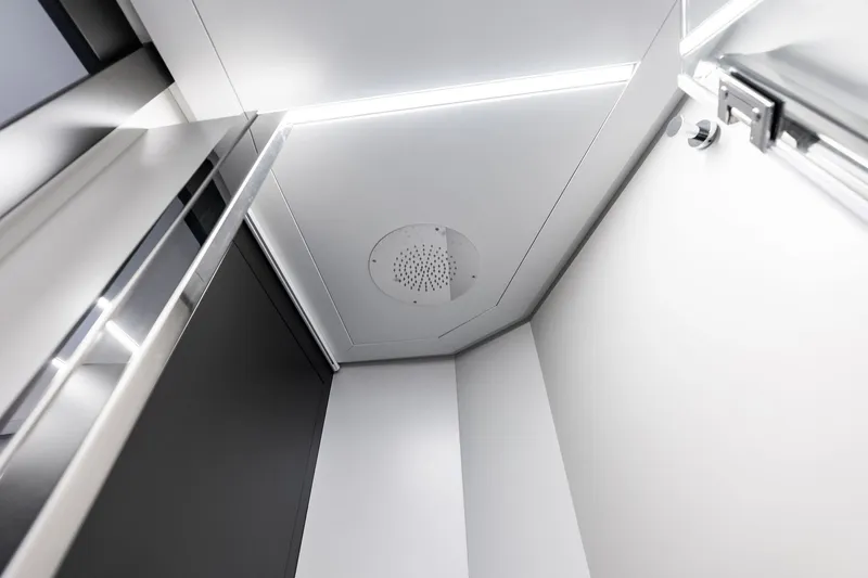  Yacht Photos Pics Modern interior of 2024 Pershing 6X yacht, featuring sleek design and lighting.