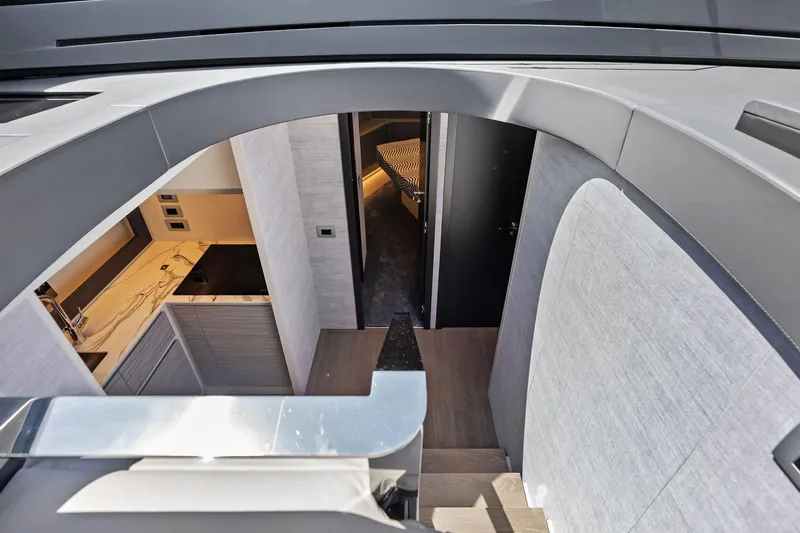  Yacht Photos Pics Interior view of 2024 Pershing 6X yacht, featuring modern design and luxurious finishes.