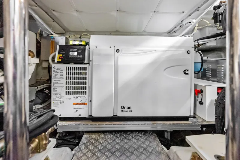  Yacht Photos Pics Engine room of 2024 Pershing 6X yacht featuring Onan Marine QD generator.