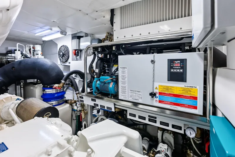  Yacht Photos Pics Engine room of 2024 Pershing 6X yacht featuring advanced machinery and equipment.