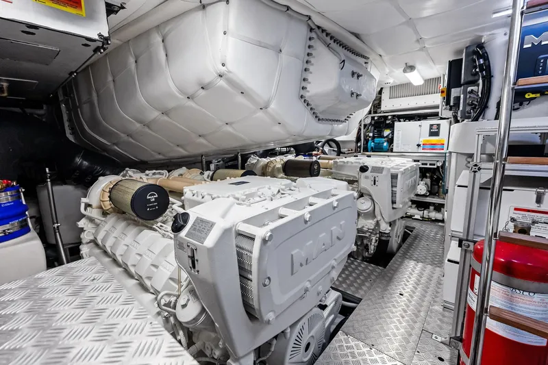  Yacht Photos Pics Engine room of 2024 Pershing 6X yacht with MAN engines and modern equipment.