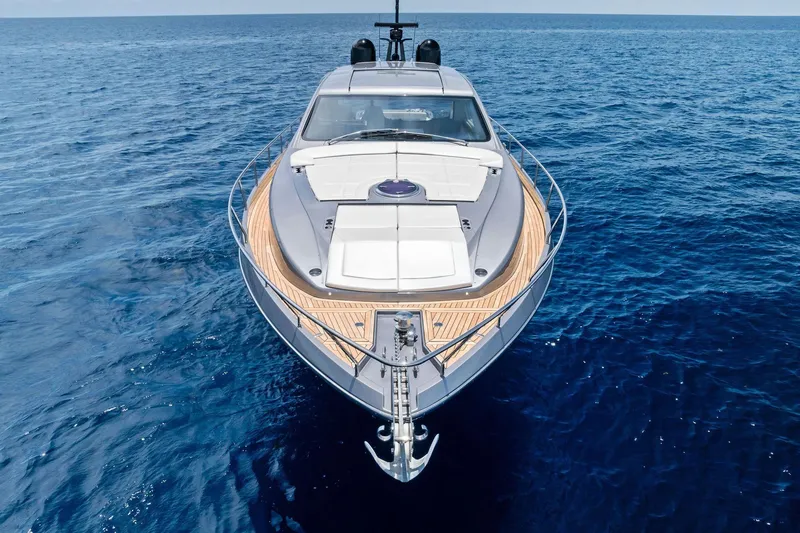  Yacht Photos Pics 2024 Pershing 6X yacht cruising on open sea, showcasing sleek design and luxury features.