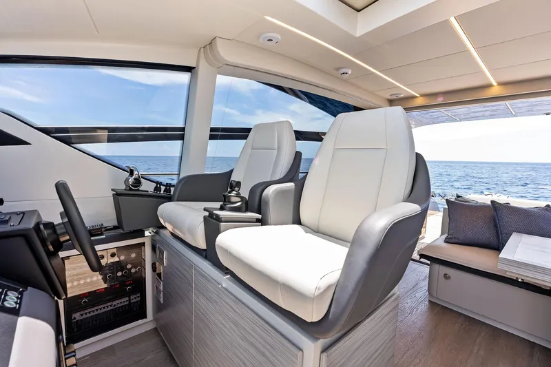  Yacht Photos Pics Luxurious interior of 2024 Pershing 6X yacht with modern seating and ocean view.