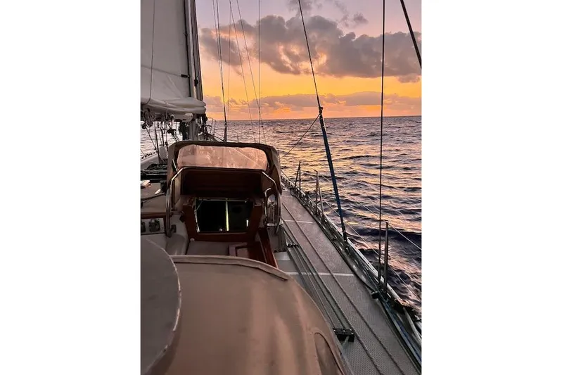  Yacht Photos Pics Sailing on a 1985 Robert Clark Ketch at sunset, ocean view.