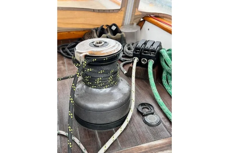  Yacht Photos Pics Winch and ropes on 1985 Robert Clark Ketch sailboat deck.