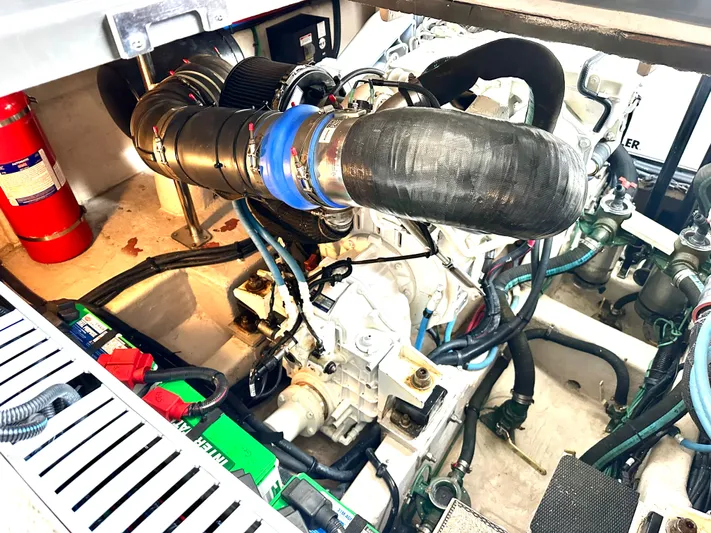  Yacht Photos Pics Engine room of 2016 Sea Ray 400 Sundancer with fire extinguisher.