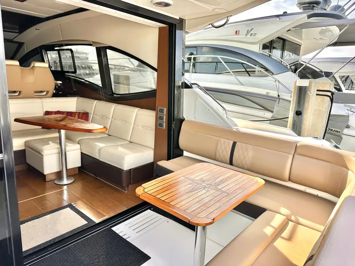  Yacht Photos Pics Interior of 2016 Sea Ray 400 Sundancer with luxurious seating area.