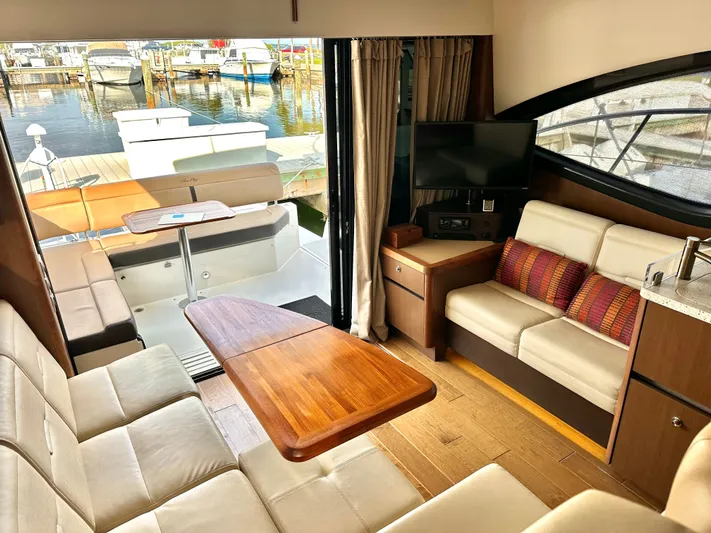  Yacht Photos Pics Interior of a 2016 Sea Ray 400 Sundancer yacht with elegant furnishings.