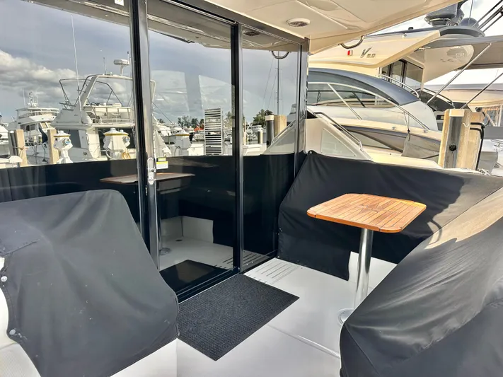  Yacht Photos Pics Sea Ray 400 Sundancer 2016 yacht with covered seating area.