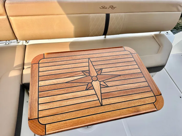  Yacht Photos Pics Wooden table with compass design on Sea Ray 400 Sundancer 2016.