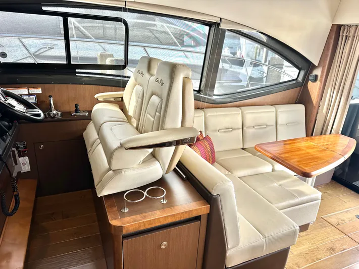  Yacht Photos Pics Interior of a 2016 Sea Ray 400 Sundancer yacht with leather seating.