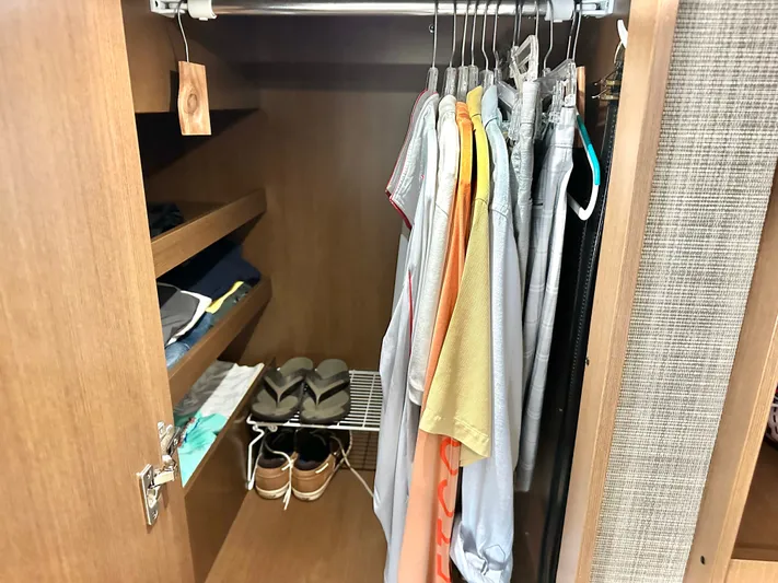  Yacht Photos Pics Closet in 2016 Sea Ray 400 Sundancer with clothes and shoes.