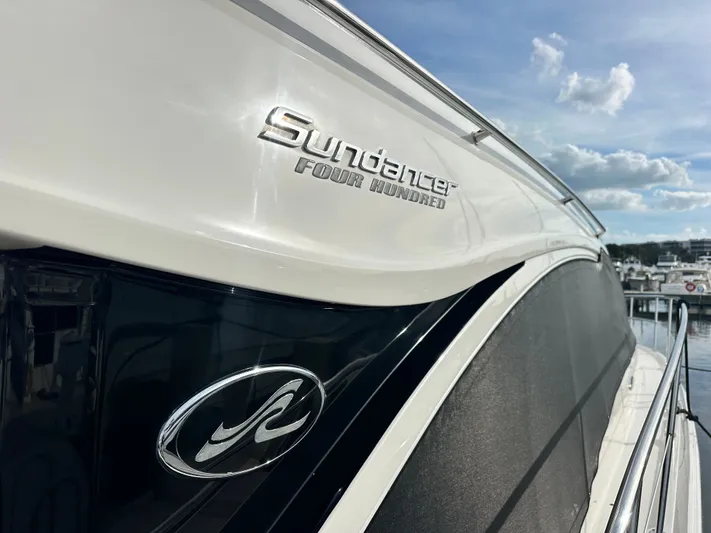  Yacht Photos Pics Sea Ray 400 Sundancer 2016 yacht docked under sunny skies.