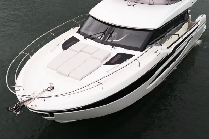  Yacht Photos Pics Luxury Prestige F4.9 yacht, 2026 model, cruising on water with sleek design.