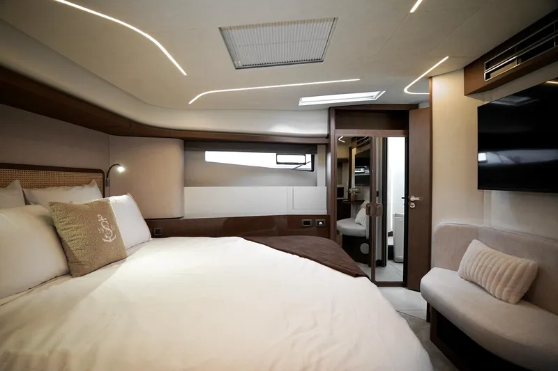  Yacht Photos Pics Luxurious interior of 2026 Prestige F4.9 yacht with modern bedroom design.