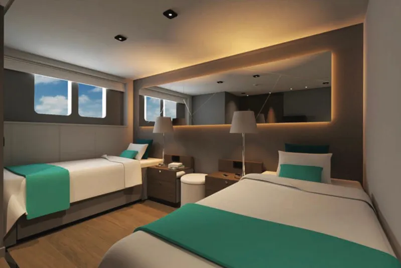 Nirvana Yacht Photos Pics Modern twin bedroom with teal accents, large mirror, and ambient lighting, 2027 design.