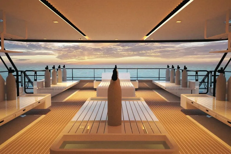 Nirvana Yacht Photos Pics Luxurious yacht deck with sunset view, featuring modern design and custom 2027 model elements.