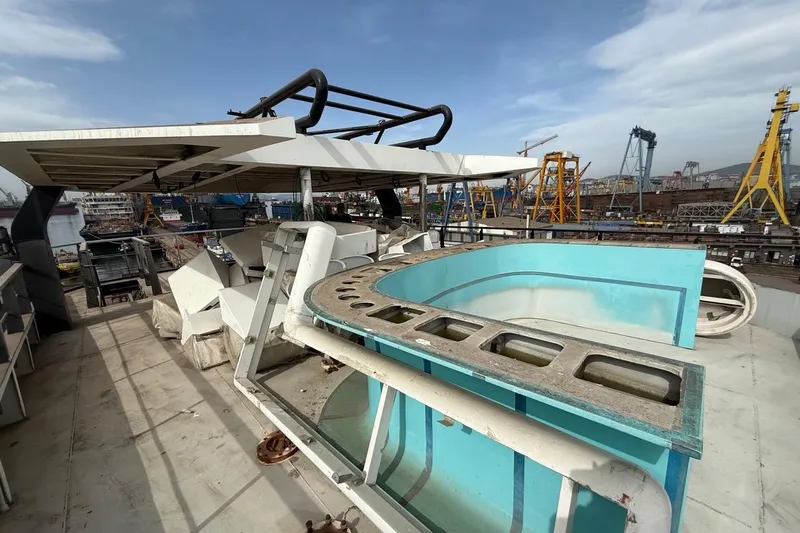 Nirvana Yacht Photos Pics Rooftop view of Soyaslan Custom 2027 yacht under construction at a shipyard.