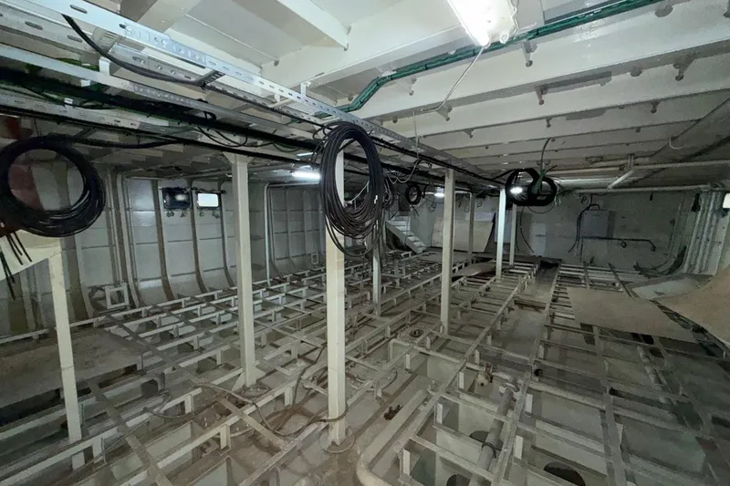 Nirvana Yacht Photos Pics Interior of a 2027 Soyaslan Custom ship under construction, showing framework and wiring.