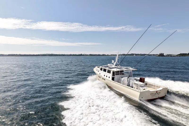 Stella Rose Yacht Photos Pics 2021 Mussel Ridge Downeast boat cruising on open water under clear skies.
