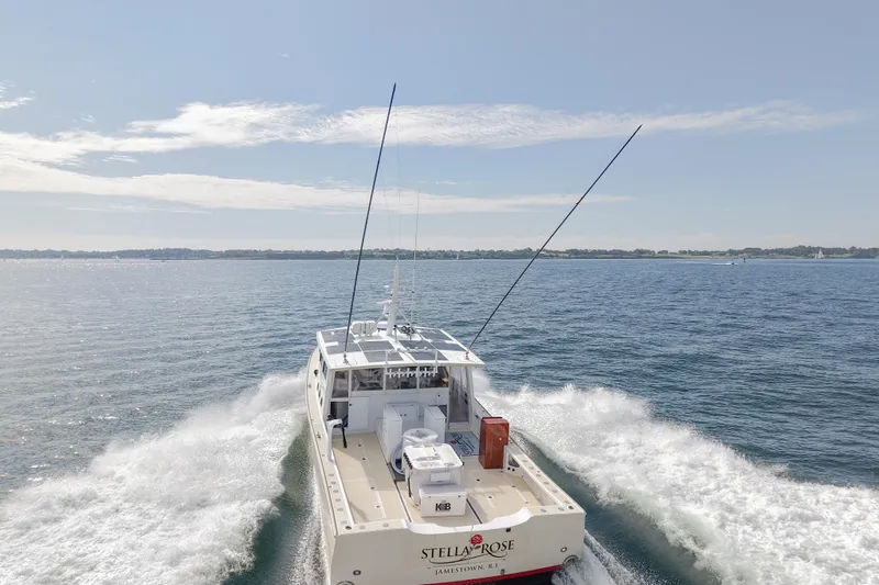 Stella Rose Yacht Photos Pics 2021 Mussel Ridge downeast boat cruising on open water under clear skies.