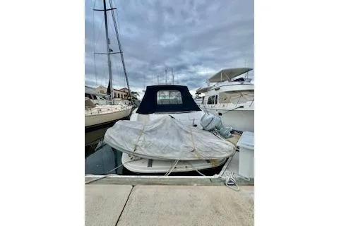 Play It Again Yacht Photos Pics 2001 Sea Ray Sundancer 540 docked at marina under cloudy sky.