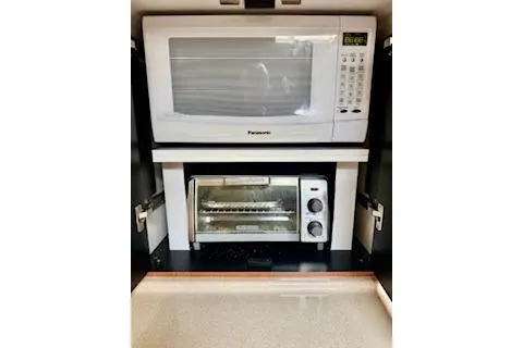 Play It Again Yacht Photos Pics Microwave and toaster oven in 2001 Sea Ray Sundancer 540 yacht kitchen.