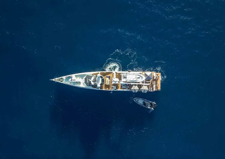 Bad Company Support Yacht Photos Pics Aerial view of Damen YS 4508 yacht on blue ocean, 2019.