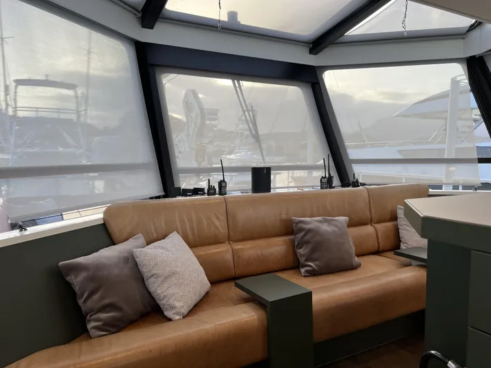 Bad Company Support Yacht Photos Pics Interior of Damen YS 4508 yacht, 2019, featuring leather sofa and cushions.