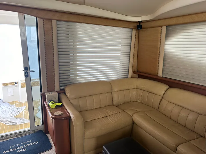  Yacht Photos Pics Interior of 2006 Silverton 48 Convertible yacht with beige leather seating.