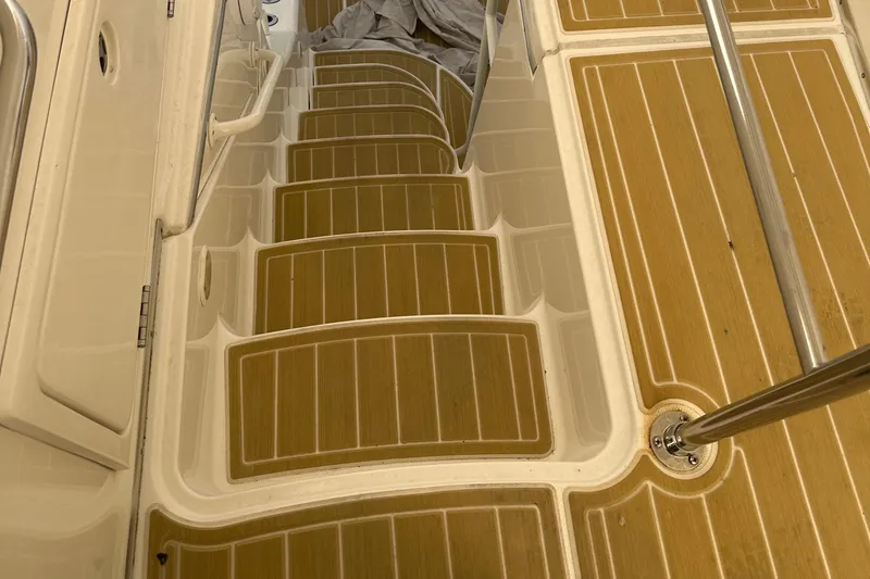  Yacht Photos Pics Staircase on a 2006 Silverton 48 Convertible yacht with teak flooring.