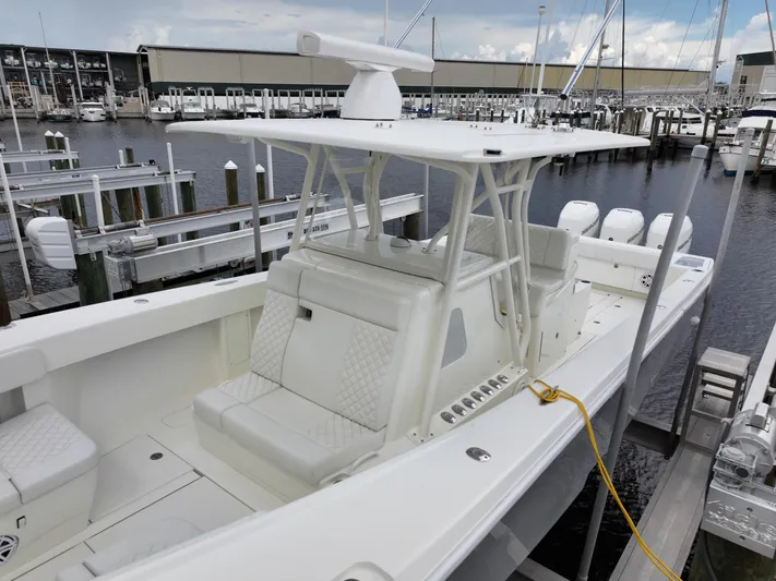  Yacht Photos Pics 2017 SeaVee 370z boat docked at marina, featuring spacious seating and modern design.