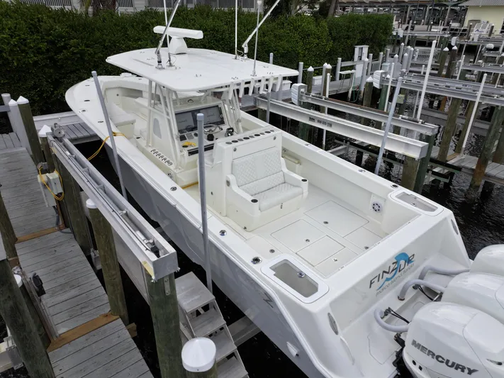  Yacht Photos Pics 2017 SeaVee 370z boat docked, featuring spacious deck and Mercury engines.