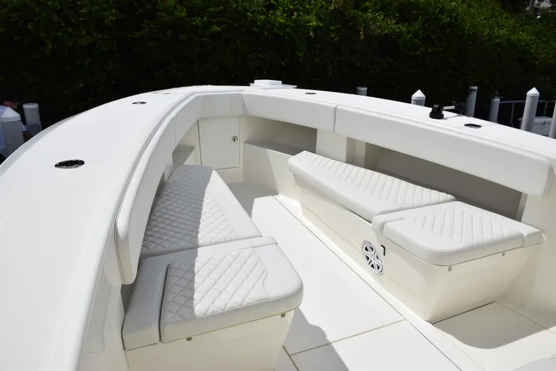  Yacht Photos Pics 2017 SeaVee 370z boat interior with white cushioned seating.