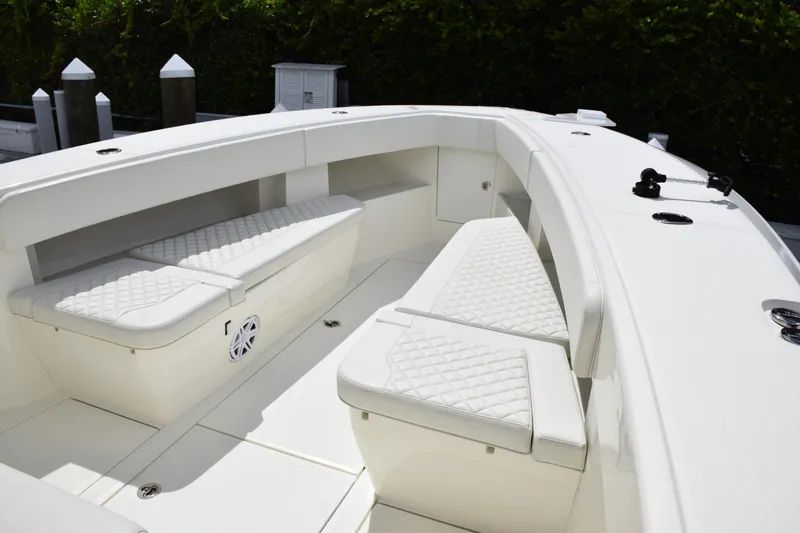  Yacht Photos Pics 2017 SeaVee 370z boat interior with white cushioned seating and sleek design.