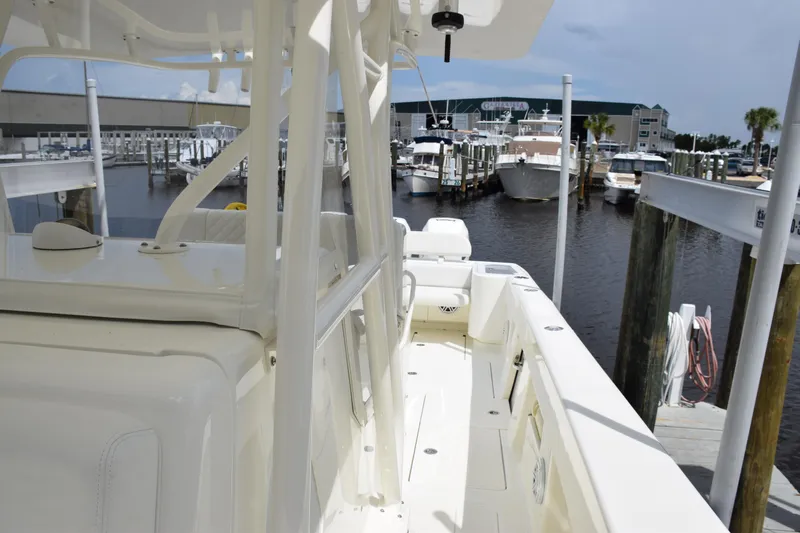  Yacht Photos Pics 2017 SeaVee 370z boat docked at a marina, showcasing sleek design and spacious deck.