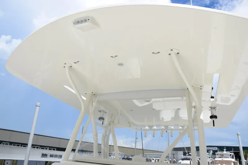  Yacht Photos Pics 2017 SeaVee 370z boat top view with white canopy and support poles.