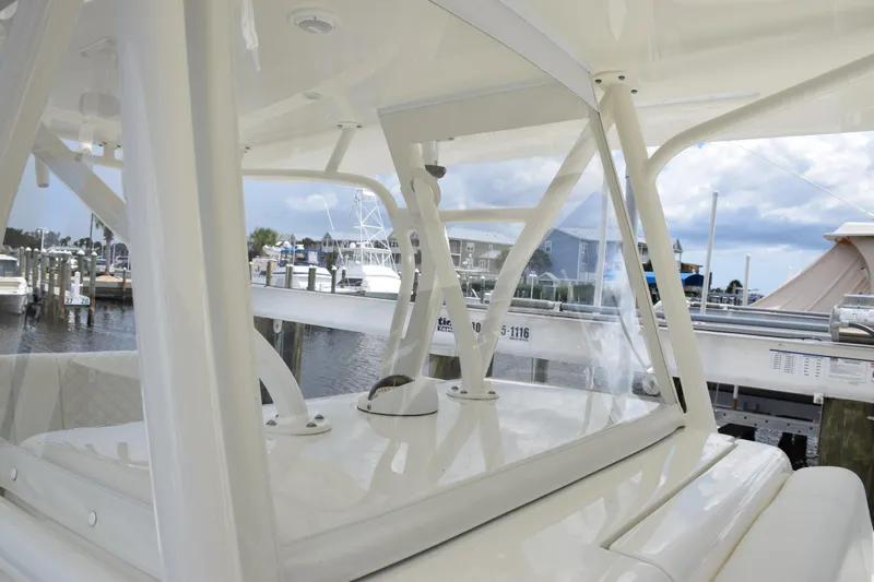  Yacht Photos Pics 2017 SeaVee 370z boat interior with marina view, showcasing sleek design and structure.