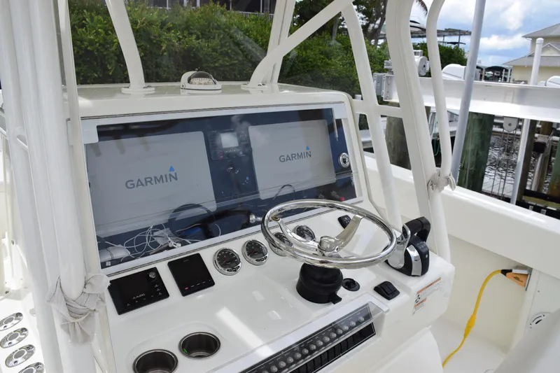  Yacht Photos Pics 2017 SeaVee 370z boat dashboard with Garmin navigation system and steering wheel.